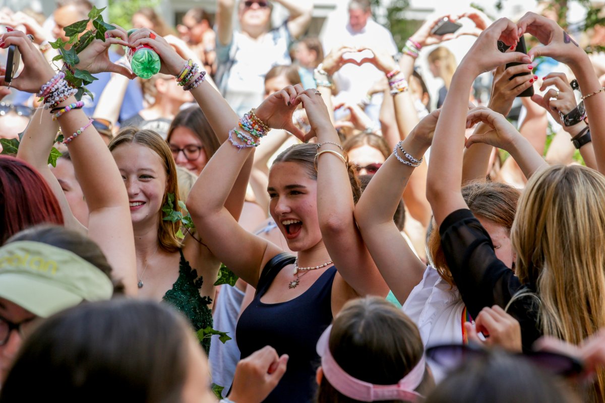 Swifties sing and dance in Vienna on Friday, Aug. 9, 2024.