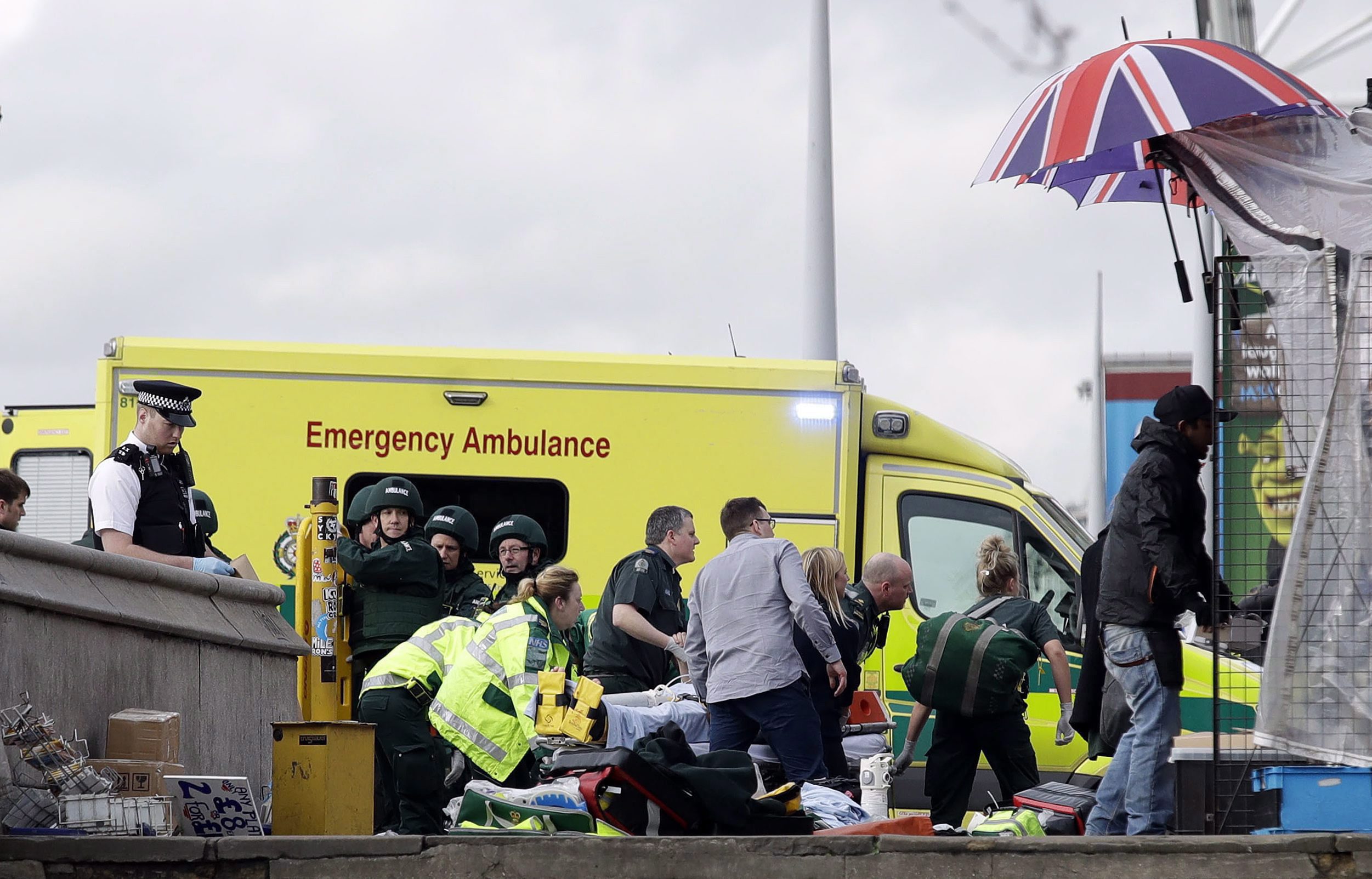Emergency responders at the scene of a March 22, 2017, terrorist attack in London by an Al-Muhajiroun supporter. (AP Photo/Matt Dunham)