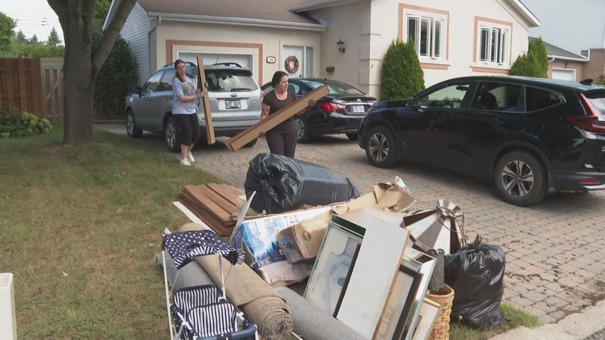 Sainte-Anne-de-Bellevue residents clean up after tropical storm Debby’s leftovers brought historic rain to the town.