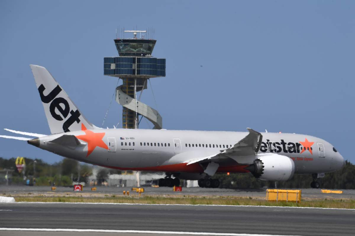A Jetstar plane on the tarmac.