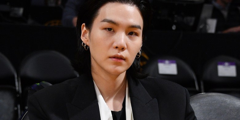 BTS member Suga fined, 'deeply sorry' for driving scooter while drunk