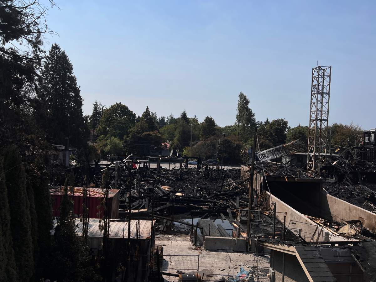 The remains of the fire that tore through a building under construction in Vancouver's Dunbar area on Tuesday night.