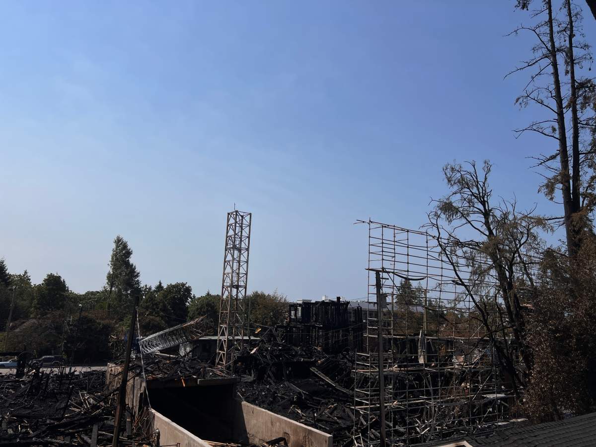 The remains of the fire that tore through a building under construction in Vancouver's Dunbar area on Tuesday night.