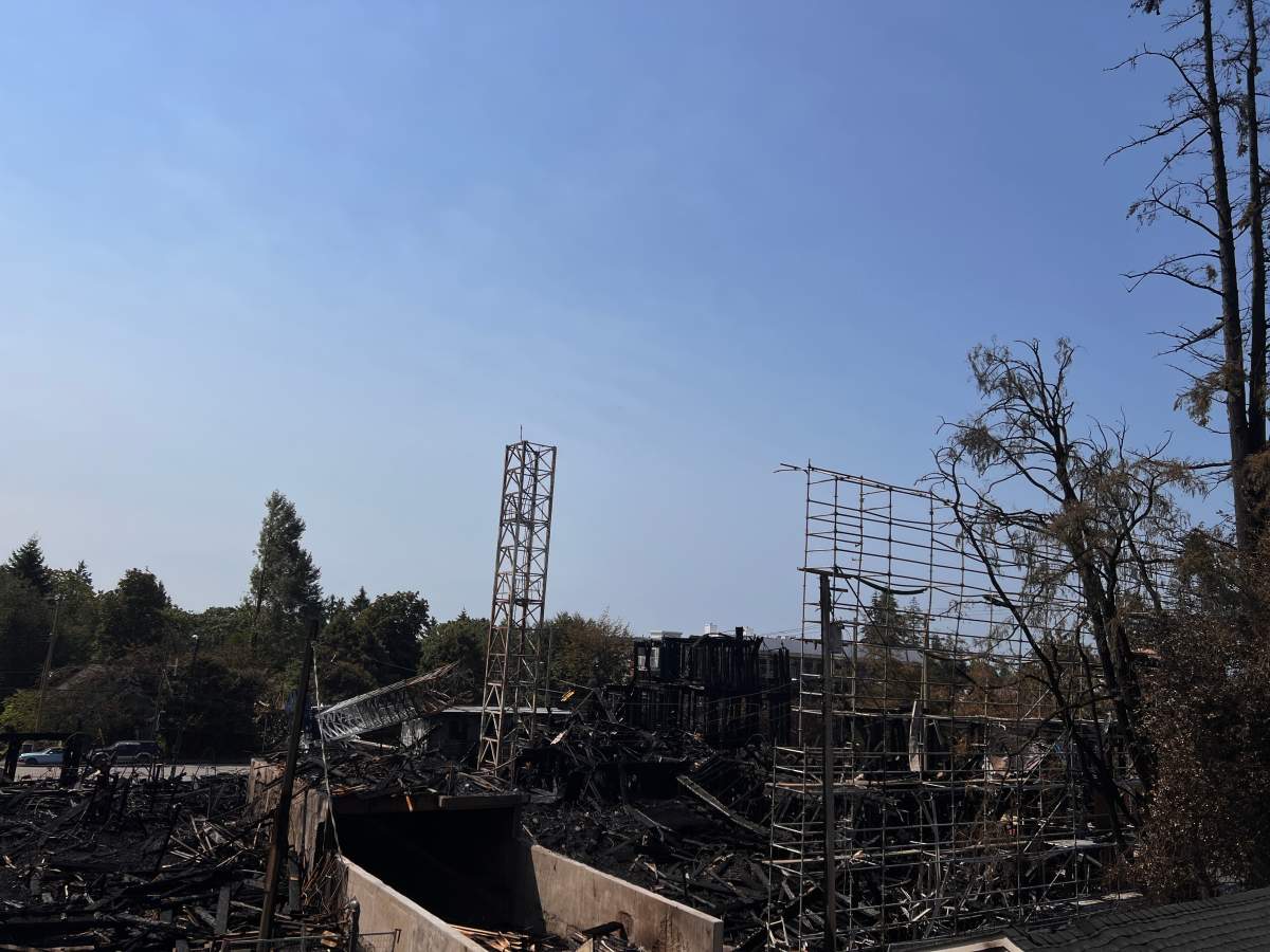 The remains of the fire that tore through a building under construction in Vancouver's Dunbar area on Tuesday night.