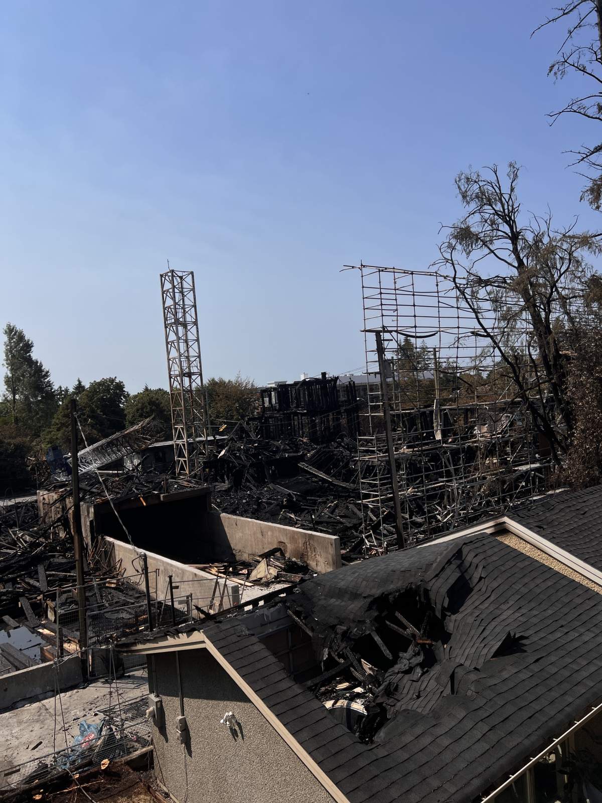 The remains of the fire that tore through a building under construction in Vancouver's Dunbar area on Tuesday night.