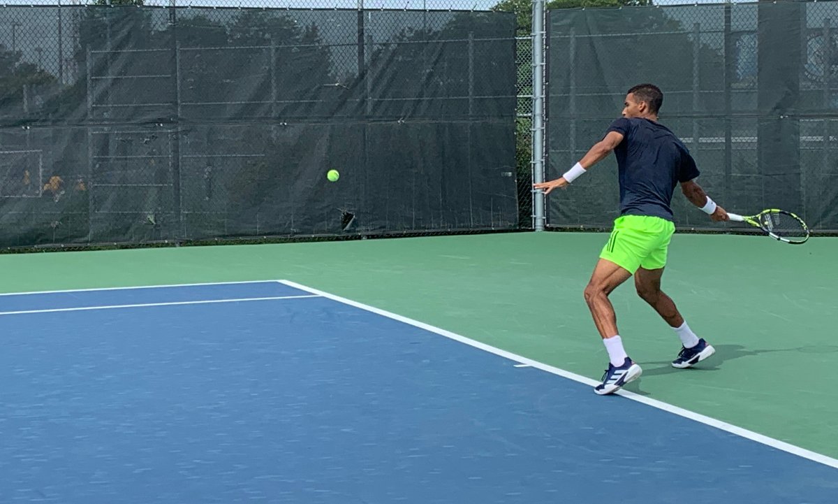 Félix Auger-Aliassime practising at the National Bank Open.