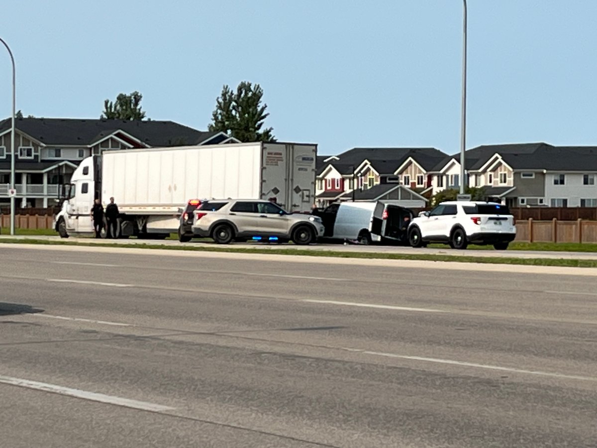 Police on the scene of an incident at Kenaston Boulevard Friday afternoon. 