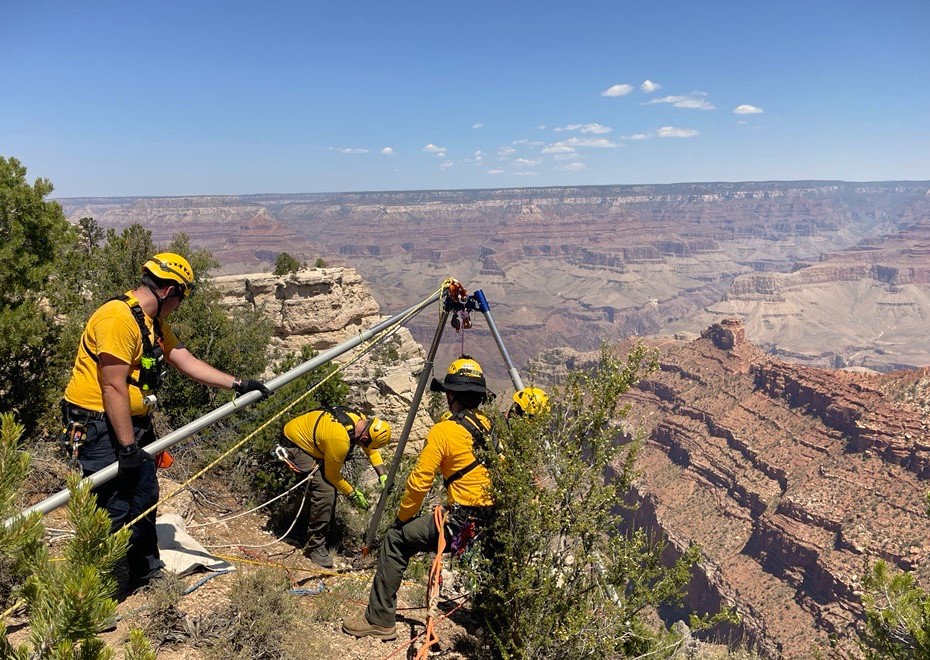 Photo showing park rangers using a system of ropes and pulleys to recover the body of 20-year-old college student Abel Joseph Mejia.