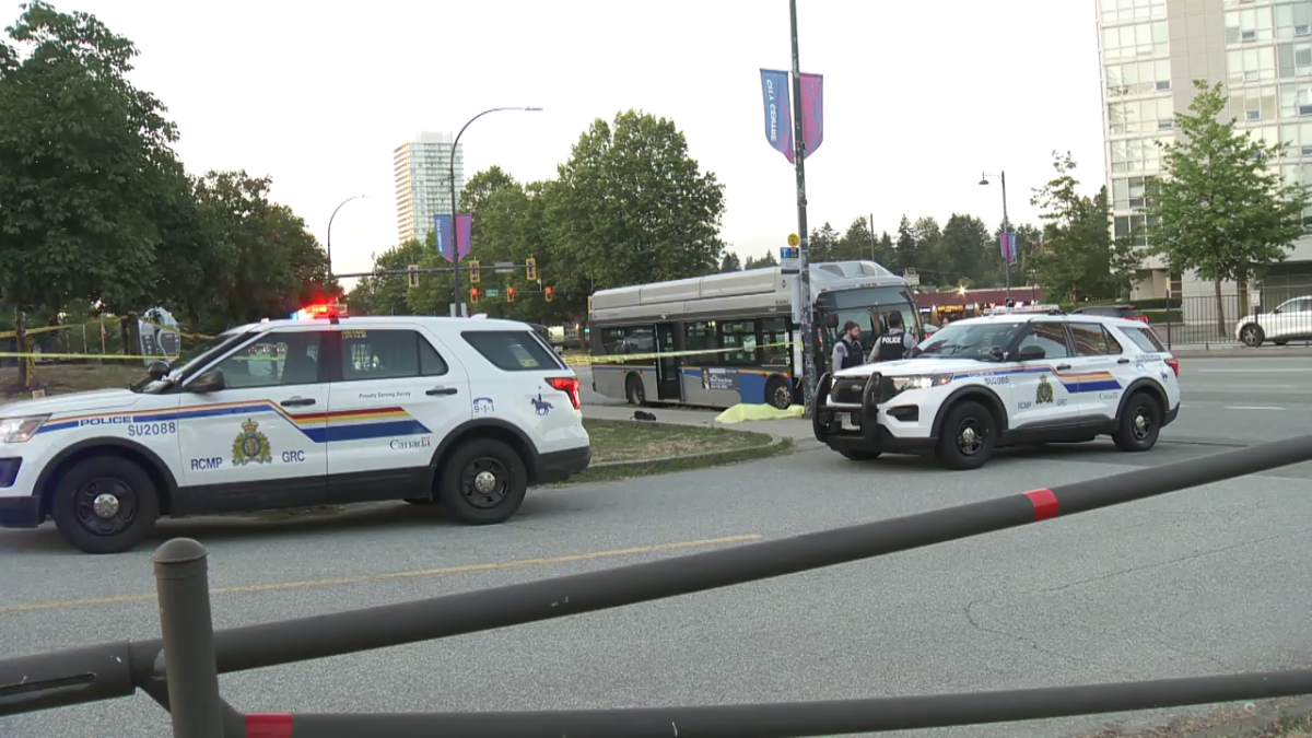 Police at the scene of a sudden death in Surrey on Wednesday.