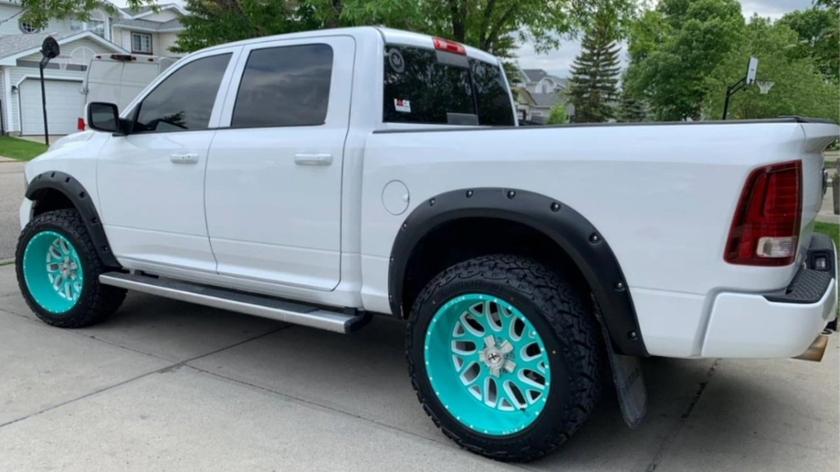 A stolen Dodge Ram with aftermarket rims that Alberta RCMP are searching for after a fatal shooting in Rocky View County on Tuesday, Aug. 6, 2024.