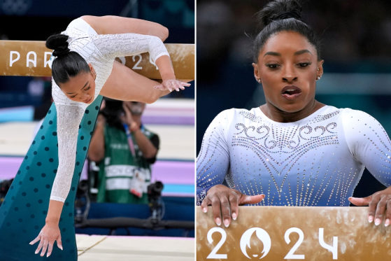 Sunisa Lee (L) falls from the balance beam and Simone Biles (R) pauses for a moment on the floor after falling from the beam during the women's individual finals on August 5, 2024 at the Paris Olympic Games.