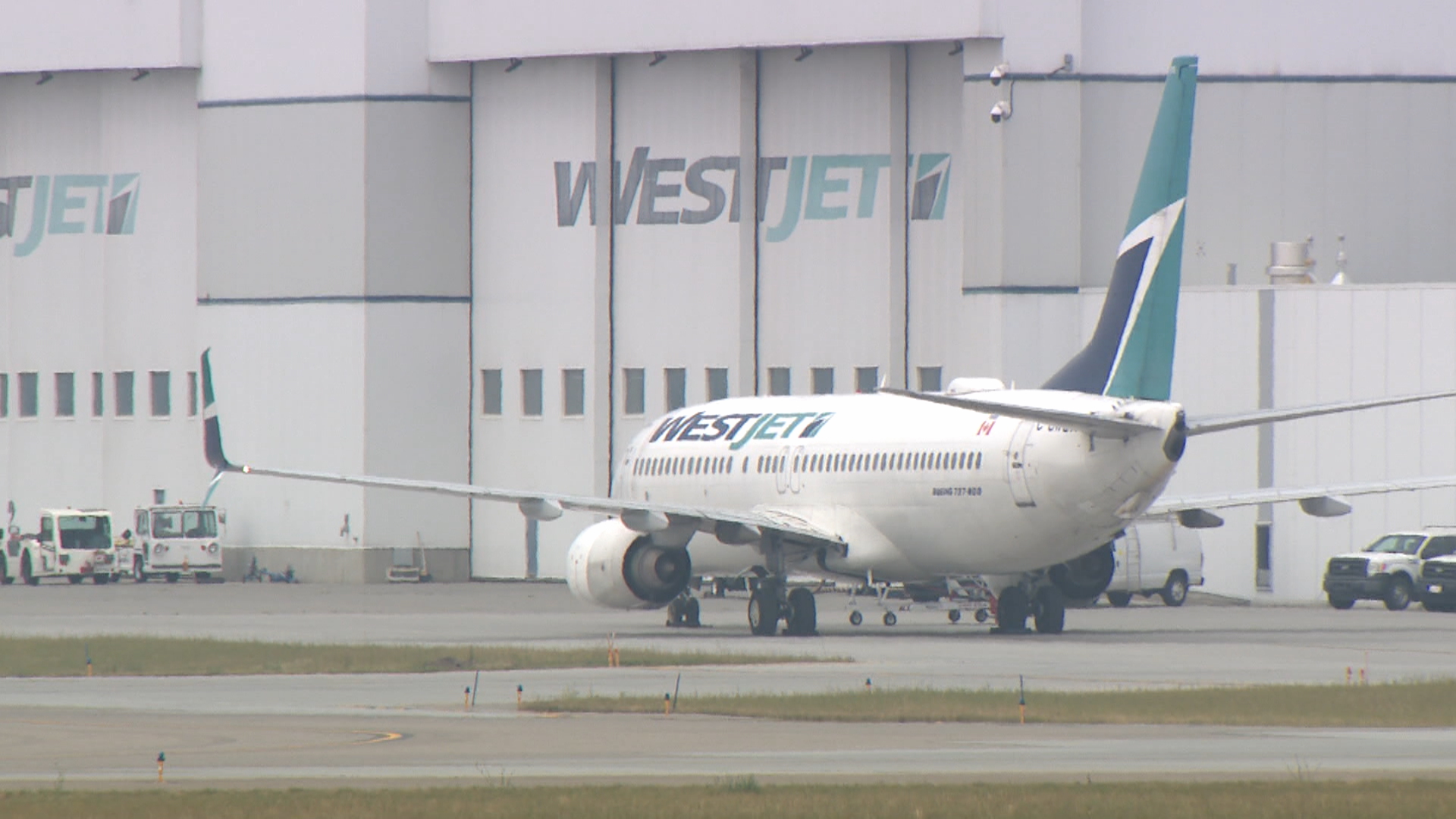 WestJet warns flight cancellations following Calgary hailstorm will continue