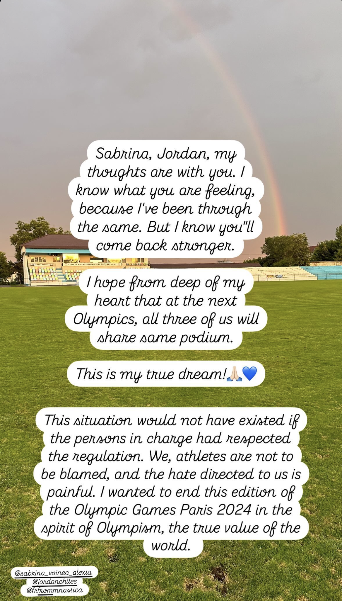 A statement posted to Ana Bărbosu's Instagram story. Black text with a white background overlayed on a photo of a field with a rainbow.