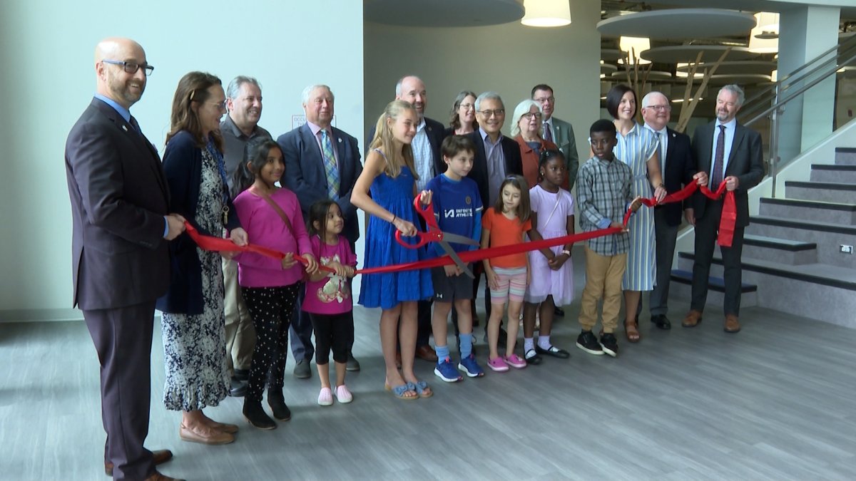 St. Genevieve Catholic School in Kingston opened Thursday morning. Serving K-8, it features a 'Learning Community' model with collaborative 'Learning Studios.'.