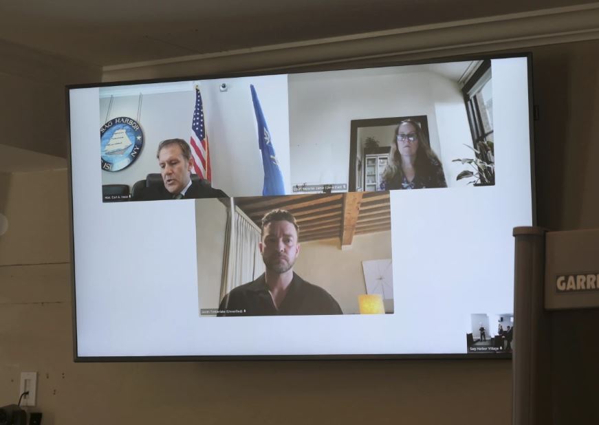 Justin Timberlake, centre, appears by video during his arraignment in Sag Harbor Justice Carl Irace’s courtroom on Friday, Aug. 2, 2024 in Sag Harbor, N.Y.