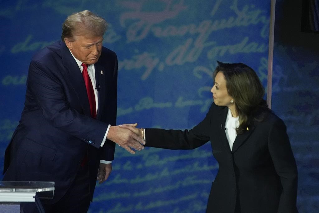 Republican presidential nominee former President Donald Trump shakes hands with Democratic presidential nominee Vice President Kamala Harris during an ABC News presidential debate at the National Constitution Center, Tuesday, Sept.10, 2024, in Philadelphia. (AP Photo/Alex Brandon).