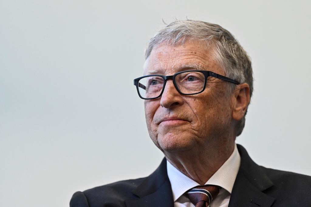 FILE - Bill Gates reacts during a visit with Britain's Prime Minister Rishi Sunak at the Imperial College University, in central London, Feb. 15, 2023. (Justin Tallis/Pool Photo via AP, File).