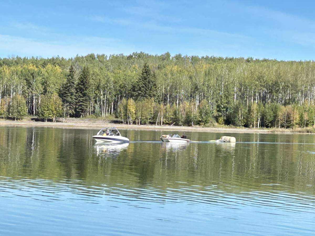 A car submerged in Alberta's Floatingstone Lake removed Tuesday, Sept. 17, 2024.