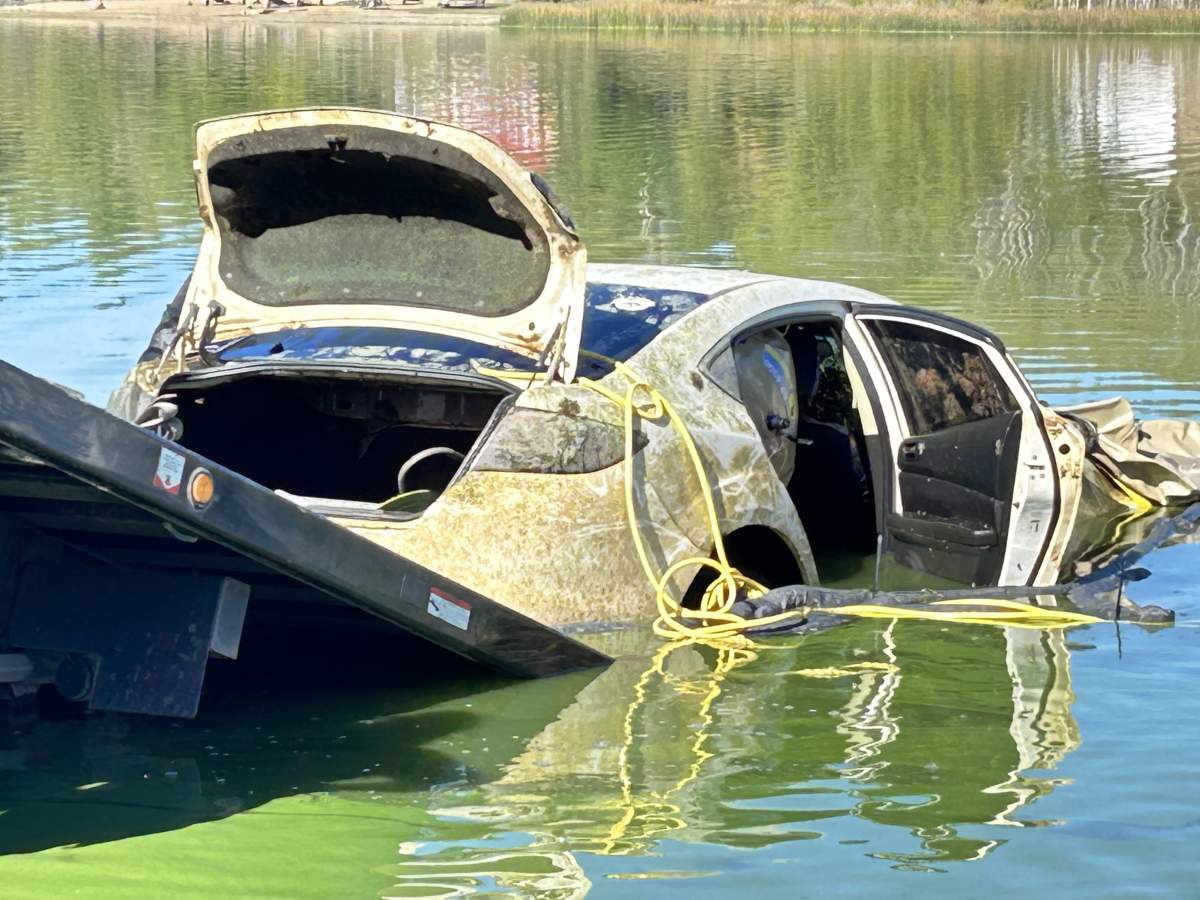 A car submerged in Alberta's Floatingstone Lake removed Tuesday, Sept. 17, 2024.