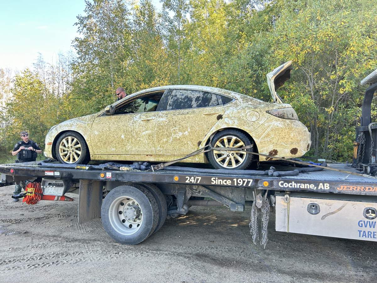 A car submerged in Alberta's Floatingstone Lake removed Tuesday, Sept. 17, 2024.