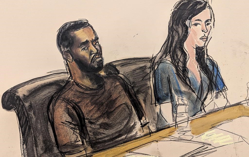 Depicted in this courtroom sketch, Sean "Diddy" Combs, left, sits at the defence table with one of his lawyers, Teny Garagos, during his bail hearing, Wednesday, Sept. 18, 2024, in New York.