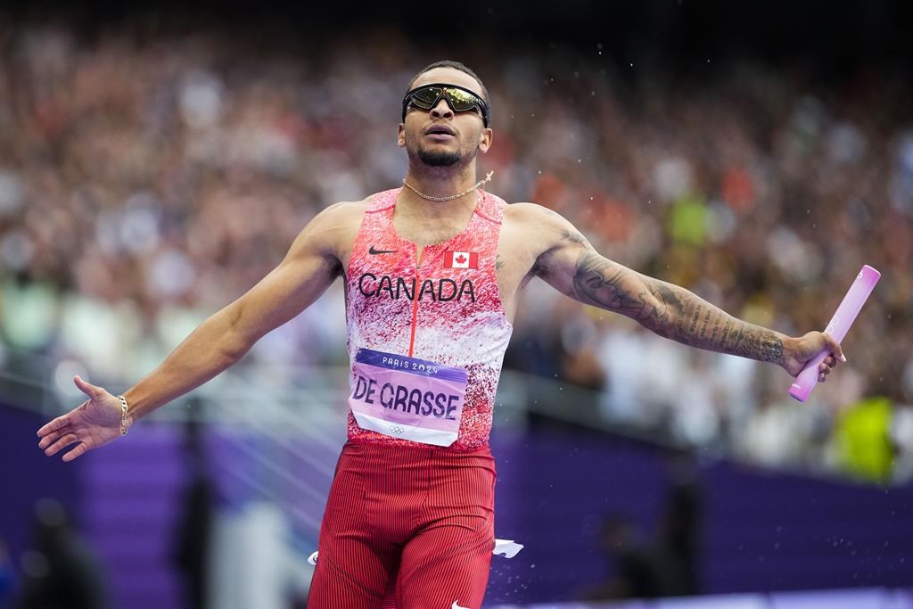 Canadian track star Andre De Grasse enjoying reception after latest Olympic medal