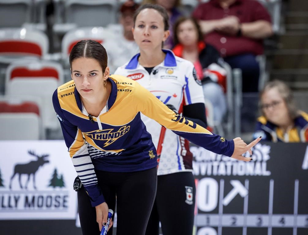 Team Wood skip Gabrielle Wood, left, directs her teammates as Team Homan skip Rachel Homan looks on during curling action at the PointsBet Invitational in Calgary, Alta., Wednesday, Sept. 25, 2024. THE CANADIAN PRESS/Jeff McIntosh.