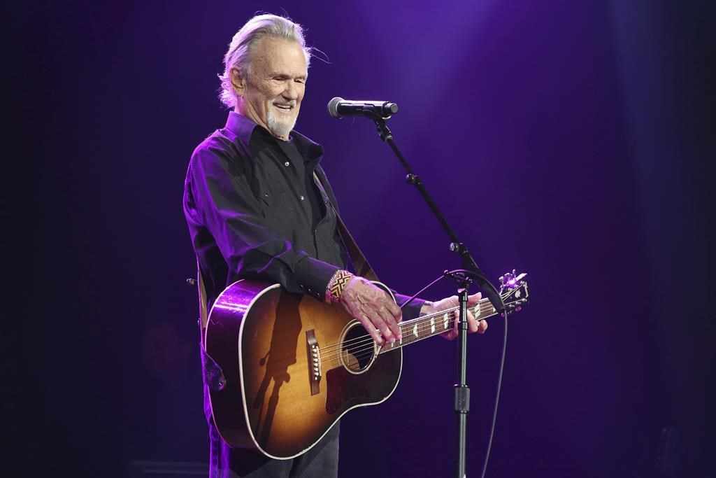 FILE - Artist and songwriter Kris Kristofferson performs "Sunday Morning Coming Down" at the Nashville Songwriters Association International "50 Years of Songs" at the Ryman Auditorium, Sept. 20, 2017, in Nashville, Tenn.