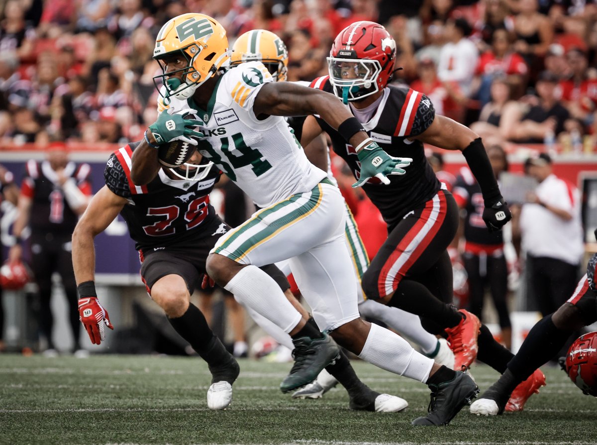 Elks receiver Tevin Jones speeds past a Calgary Stampeders defender during the Labour Day Classic on Monday, September 2, 2024.