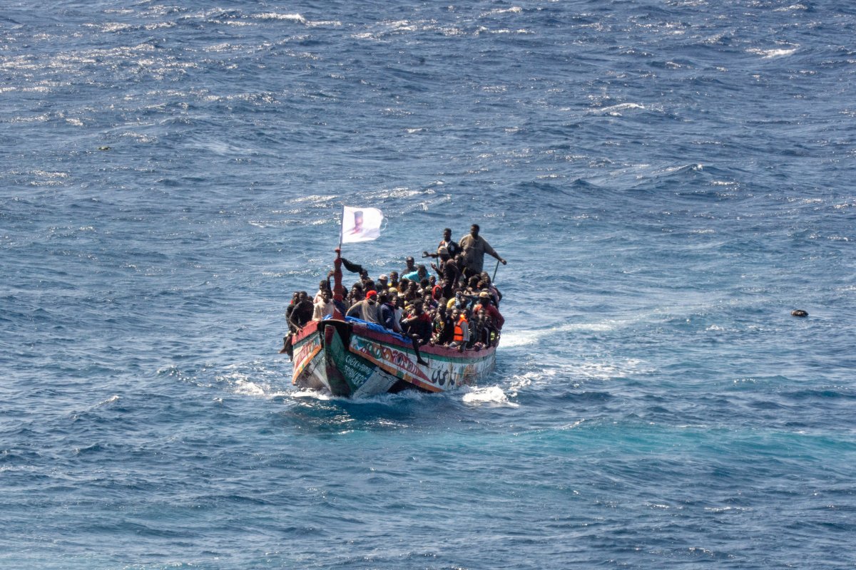 Photo of an earlier migrant crossing, showing people in a a wooden boat as they sail to the port in La Restinga on the Canary island of El Hierro, Spain, on Aug. 18, 2024. This is not the boat that sank.