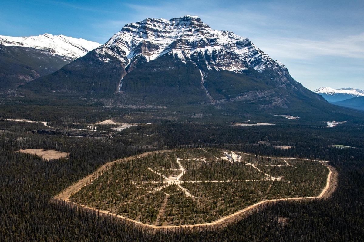 An aerial view of Parks Canada’s caribou captive breeding centre in Jasper National Park, taken before this summer’s wildfire is shown in this handout image provided by Parks Canada. Although much of the centre’s habitat was burned and some construction damaged, officials say recovery is proceeding well and pregnant cows may be welcomed as early as this winter. The centre is intended to produce calves in a safe environment to replenish the park’s near-vanished herds.