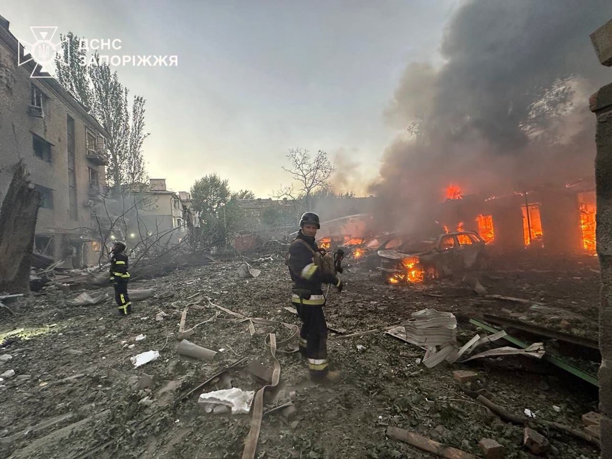 In this photo provided by the Ukrainian Emergency Service, firefighters put out the fire after Russia attacked the city with guided bombs overnight in Zaporizhzhia, Ukraine, Sunday, Sept. 29, 2024.