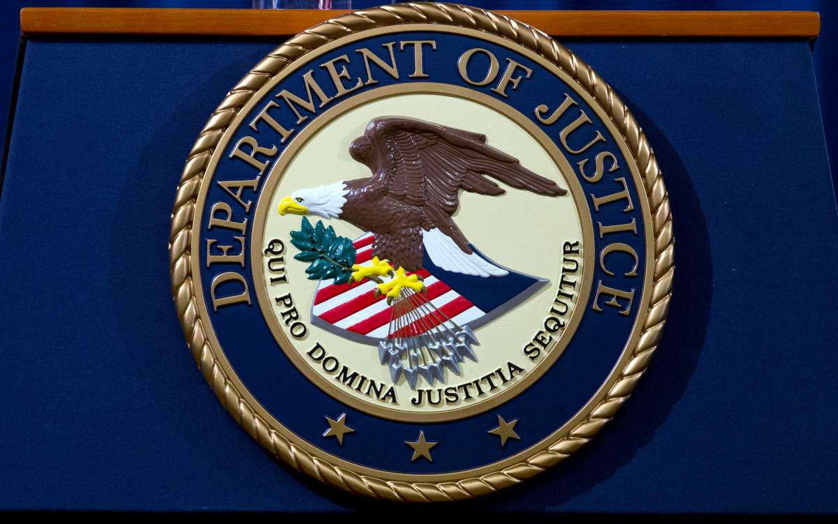 The Department of Justice seal is seen in Washington, Nov. 28, 2018.