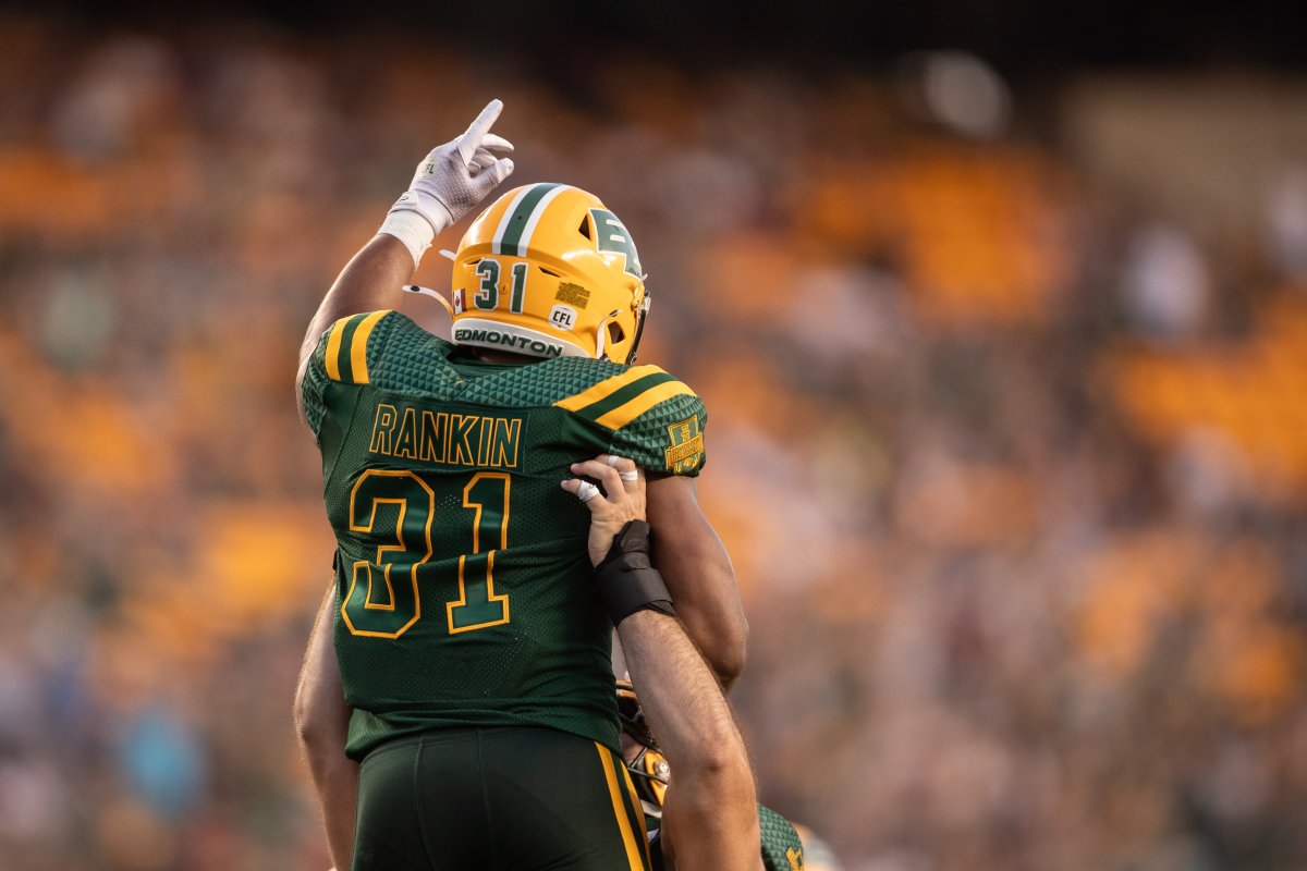 Edmonton Elks Justin Rankin (31) get's lifted up by a teammate after scoring a touchdown against the Calgary Stampeders during CFL action in Edmonton, Alberta, on Saturday September 7, 2024. 