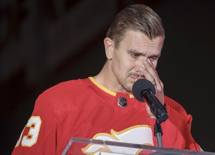 Calgary Flames' Mikael Backlund speaks at a vigil for former Calgary Flames player Johnny Gaudreau and his brother Matthew in Calgary, Alta., Wednesday, Sept. 4, 2024. The brothers were struck and killed by a suspected drunk driver last week while cycling near their childhood home in New Jersey.