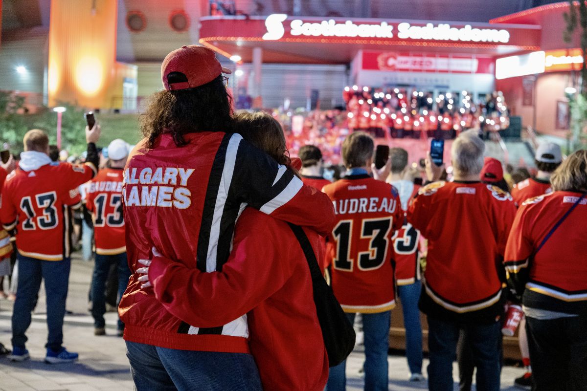 Fans gathered on the front steps of the Scotiabank Saddledome on an emotional Wednesday night as the Calgary Flames held a candlelight vigil for Johnny Gaudreau and his brother Matthew.