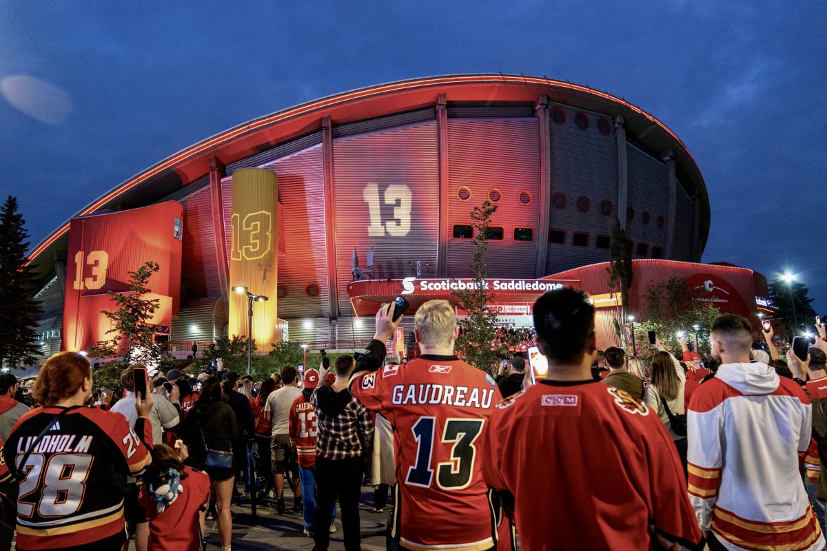 Fans gathered on the front steps of the Scotiabank Saddledome on an emotional Wednesday night as the Calgary Flames held a candlelight vigil for Johnny Gaudreau and his brother Matthew.