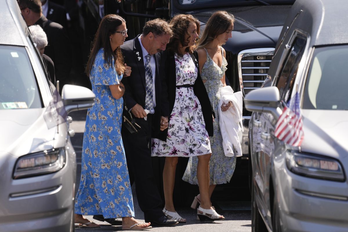 Mourners arrive for a funeral for Columbus Blue Jackets hockey player John Gaudreau Gaudreau and his brother Matthew Gaudreau at St. Mary Magdalen Catholic Church in Media, Pa., Monday, Sept. 9, 2024.