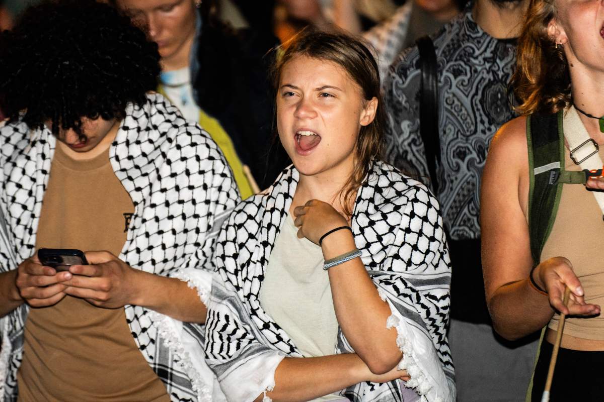 Swedish climate activist Greta Thunberg (C) is pictured during the demonstration 'Academic Boycott Now!' as 'Students Against Occupation' march from the University of Copenhagen's City Campus to Vor Frue Square in Copenhagen, Denmark, on September 4, 2024.