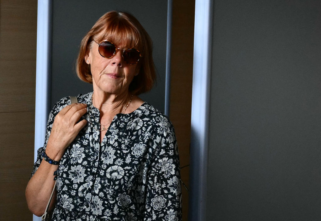 Gisèle Pélicot walks during an interuption at the Avignon courthouse as she attends the trial of her former partner Dominique Pelicot accused of drugging her for nearly ten years and inviting strangers to rape her at their home in Mazan, a small town in the south of France, in Avignon, on September 17, 2024. A court in the southern town of Avignon is trying Dominique Pélicot, a 71-year-old retiree, for repeatedly raping and enlisting dozens of strangers to rape his heavily sedated wife in her own bed over a decade. Fifty other men, aged between 26 and 74, are also on trial for alleged involvement, in a case that has horrified France. The court proceedings, which runs until December, are open to the public at the request of Dominique Pélicot's ex-wife and victim.