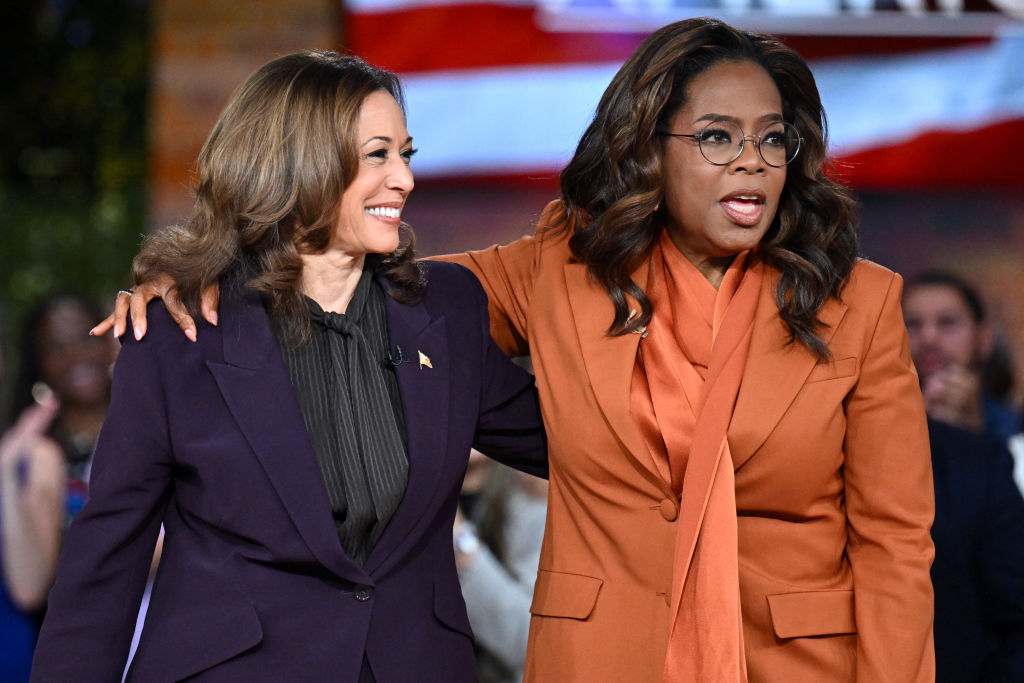 US Vice President and Democratic presidential candidate Kamala Harris (L) joins US television producer Oprah Winfrey at a 'Unite for America' live streaming rally in Farmington Hills, Michigan, on September 19, 2024.