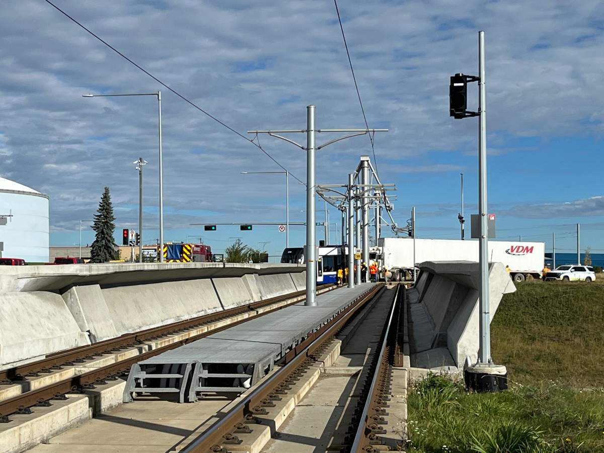 A collision between a semi tractor trailer and the Valley Line LRT on 66/75 Street at the Whitemud Drive overpass on Tuesday, Sept. 24, 2024.