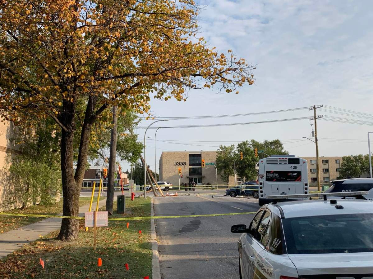 Winnipeg police have taped off an area near Portage Avenue and Bedson Street after a fatal crash Friday morning.