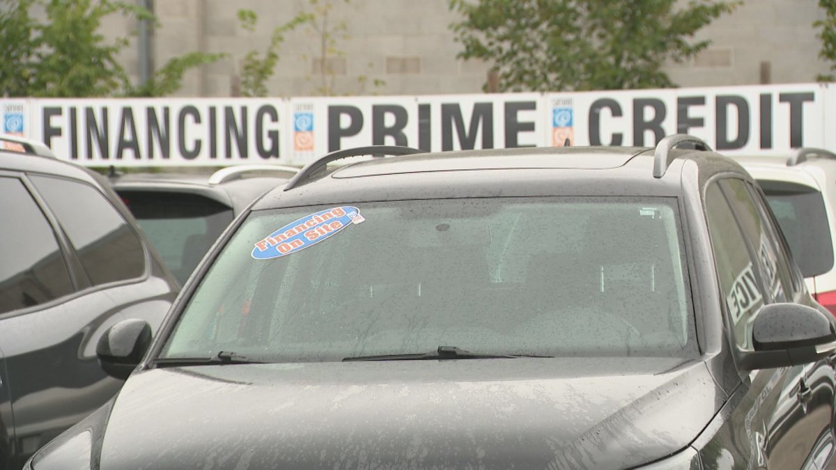 Vehicles stay parked despite the Bank of Canada lowering its interest rate for the 3rd time.