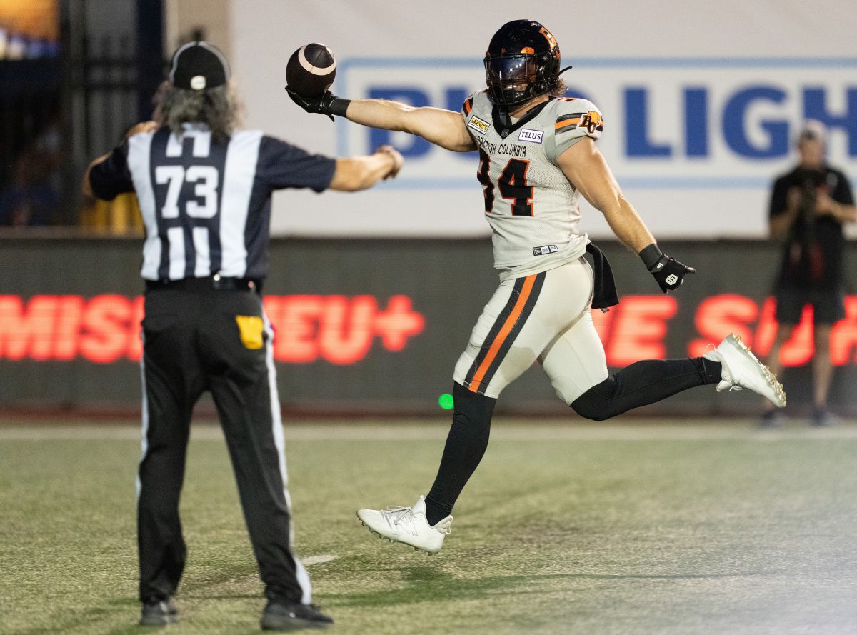 B.C. Lions fullback David Mackie (34) scores against the Montreal Alouettes during first half CFL football action in Montreal, Friday, Sept. 6, 2024.