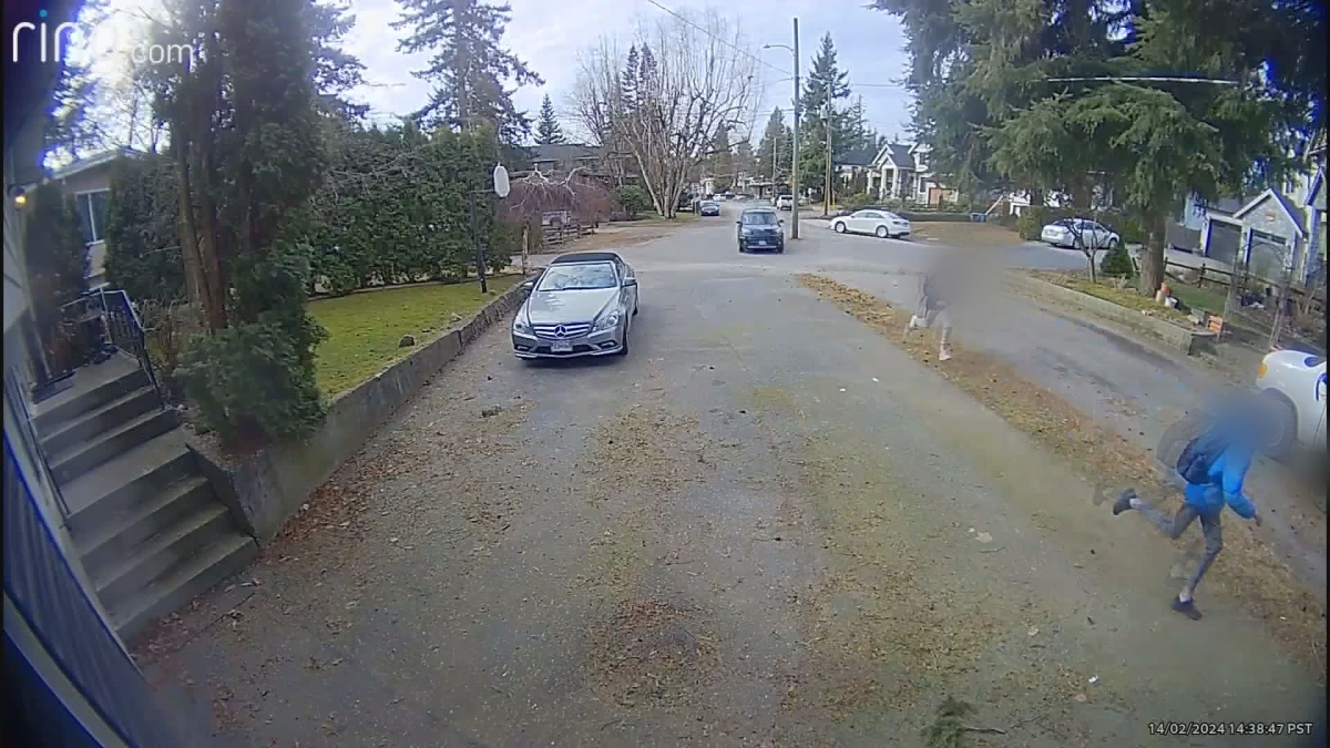 Security footage shows a vehicle chasing a group of teens in Abbotsford. 