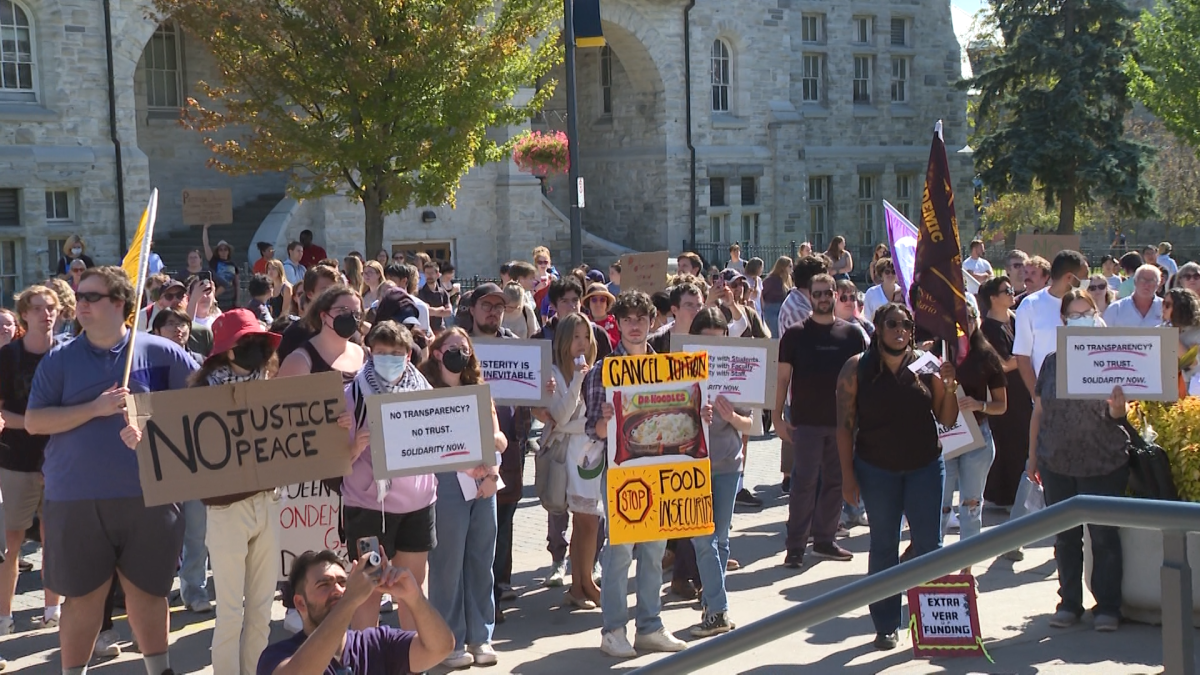 Hundreds protest proposed cuts to Queen's Graduate Awards, fearing loss of what they say is crucial funding. The university is wrestling with how to balance its budget.