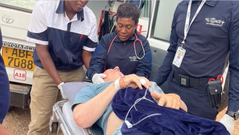 Roland Cherry is transported on a stretcher after he was attacked by a hippo.