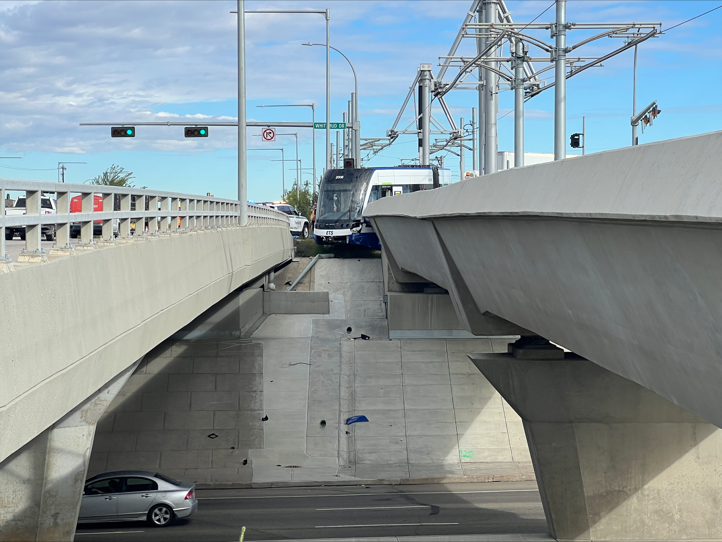 Semi turning against light and Valley Line LRT collide in southeast Edmonton