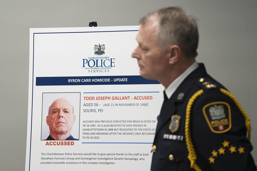 A photo of the accused Todd Joseph Gallant is seen as Charlottetown Police Services chief Brad MacConnell attends a press conference in Charlottetown, Friday, Jan. 26, 2024, regarding significant developments into the 1988 unsolved homicide of Byron Carr. THE CANADIAN PRESS/Darren Calabrese.